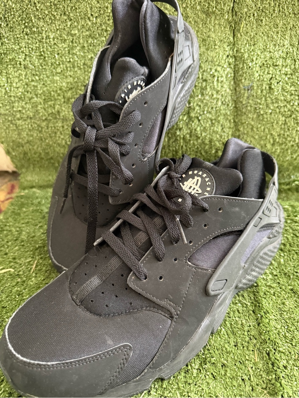 Nike Air Huarache Run Triple Black athletic sneakers